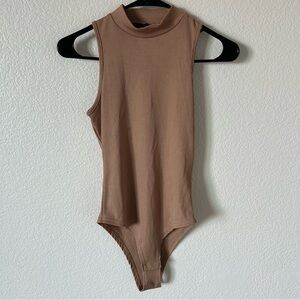 Tan Sleeveless Ribbed Turtle Neck Bodysuit One Piece